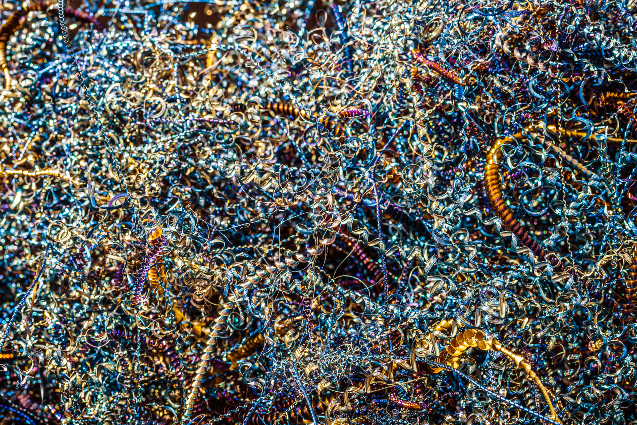 Metal spiral shavings background closeup
